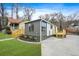 The exterior of this home features new wooden decks, manicured lawn, and fresh landscaping at 1 Lamar Ave Sw, Atlanta, GA 30310