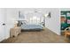 Spacious primary bedroom with carpet floors, a large bed, and natural light from the window at 1995 Meador Ave, Atlanta, GA 30315
