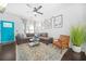 Inviting living room with wood floors, stylish decor, and a bright-colored front door at 1995 Meador Ave, Atlanta, GA 30315