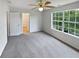 Large bedroom features new carpet, neutral paint and a bright window at 509 Carlton Pointe Dr, Palmetto, GA 30268