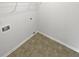 Empty laundry room with vinyl flooring and hookups for washer and dryer at 509 Carlton Pointe Dr, Palmetto, GA 30268