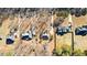 Overhead aerial view of homes in the community, highlighting tree coverage at 1585 Lake Dow Rd, Mcdonough, GA 30252