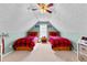 Shared bedroom with two twin beds and a vaulted ceiling at 1585 Lake Dow Rd, Mcdonough, GA 30252