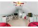 Bonus room with two twin beds, storage, and vaulted ceiling at 1585 Lake Dow Rd, Mcdonough, GA 30252
