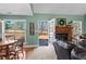 Inviting living room with a fireplace and access to outdoor area at 1585 Lake Dow Rd, Mcdonough, GA 30252