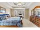Spacious main bedroom offers great natural light, a ceiling fan, and comfortable carpet at 1585 Lake Dow Rd, Mcdonough, GA 30252
