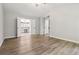 Large bedroom is bright, airy, and has hardwood flooring and high ceilings at 1931 Abinger Way, Lawrenceville, GA 30043