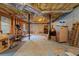 Unfinished basement with exposed ceilings, concrete floors, and visible framing at 604 Clearwater Ct, Mcdonough, GA 30252