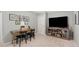 Cozy bedroom with a large television, desk, and decorative wall art, perfect for relaxing or studying at 44 Kingsford Xing, Acworth, GA 30101