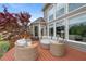 Expansive deck with stylish seating, ideal for outdoor relaxation and enjoying scenic views of the lush backyard at 44 Kingsford Xing, Acworth, GA 30101