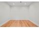 An empty room with hardwood flooring, ready for new furniture at 8160 Stone Hill Rd, Cumming, GA 30028