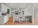 Stylish kitchen with grey cabinets, a marble island, and stainless steel appliances at 8160 Stone Hill Rd, Cumming, GA 30028