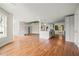 Open concept home design with hardwood floors, natural light, and a modern kitchen area at 8160 Stone Hill Rd, Cumming, GA 30028