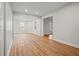 Spacious living room with hardwood floors and recessed lighting at 8160 Stone Hill Rd, Cumming, GA 30028