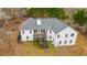 Charming home with a deck overlooking a scenic backyard, blending indoor/outdoor living at 8160 Stone Hill Rd, Cumming, GA 30028