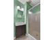 Modern bathroom featuring a unique vanity and a glass-enclosed shower at 312 Flat Shoals Church Rd, Stockbridge, GA 30281