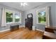 Charming bedroom featuring hardwood floors and water view at 312 Flat Shoals Church Rd, Stockbridge, GA 30281