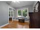 Serene bedroom featuring hardwood floors, closet, and natural light at 312 Flat Shoals Church Rd, Stockbridge, GA 30281