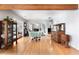 Dining room with wooden floors, a round table with chairs, and a hutch at 312 Flat Shoals Church Rd, Stockbridge, GA 30281