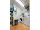 Laundry room with washer, dryer, storage shelves, and utility sink at 312 Flat Shoals Church Rd, Stockbridge, GA 30281