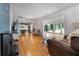Spacious living room with hardwood floors, fireplace, and view at 312 Flat Shoals Church Rd, Stockbridge, GA 30281