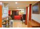 Spacious finished basement featuring kitchenette and open layout including dining and entertaining areas at 7435 Woodruff Way, Stone Mountain, GA 30087