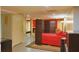Basement features spacious sleeping area with full-size bed and decorative screen for privacy at 7435 Woodruff Way, Stone Mountain, GA 30087