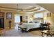 An inviting bedroom featuring an open doorway to a cozy living room at 7435 Woodruff Way, Stone Mountain, GA 30087