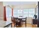 Bright dining area with large windows offering plenty of natural light at 7435 Woodruff Way, Stone Mountain, GA 30087