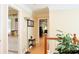 Hallway featuring hardwood floors, and a view of the bathroom at 7435 Woodruff Way, Stone Mountain, GA 30087