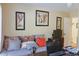 Relaxing living room with a comfortable sofa, stylish pillows, and ample lighting at 7435 Woodruff Way, Stone Mountain, GA 30087