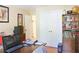 Home office features hardwood floors, closet and work space, and plenty of natural light at 7435 Woodruff Way, Stone Mountain, GA 30087