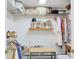 Walk-in closet features custom shelving and hanging space at 7435 Woodruff Way, Stone Mountain, GA 30087