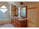 Bathroom featuring a shower, tub, and double sink vanity with granite countertops at 75 Price Dr, Locust Grove, GA 30248