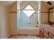 Bathroom featuring a shower, tub, and double sink vanity with granite countertops at 75 Price Dr, Locust Grove, GA 30248