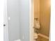Small bathroom featuring a unique urinal and tile flooring, designed for convenience at 75 Price Dr, Locust Grove, GA 30248
