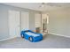 This bedroom has a car bed, multiple closets and ample natural light at 75 Price Dr, Locust Grove, GA 30248
