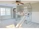 Spacious bedroom featuring a unique house-style bed with a fun slide at 75 Price Dr, Locust Grove, GA 30248
