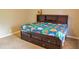Cozy bedroom featuring a platform bed with built-in storage, perfect for maximizing space at 75 Price Dr, Locust Grove, GA 30248