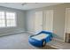 Bedroom features a unique car bed and a large window for plenty of natural light at 75 Price Dr, Locust Grove, GA 30248