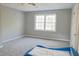 Bright bedroom featuring a car bed and a large window for plenty of natural light at 75 Price Dr, Locust Grove, GA 30248
