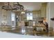 Spacious kitchen featuring a large island, stainless steel appliances, and pendant lighting at 75 Price Dr, Locust Grove, GA 30248