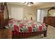 Comfortable main bedroom showcasing a large bed, ample closet space, and stylish wooden furniture at 75 Price Dr, Locust Grove, GA 30248