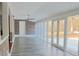 Open sun room with a full view of the outdoor pool area, offering a peaceful retreat at 75 Price Dr, Locust Grove, GA 30248