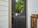 Stylish front door featuring a glass panel and contemporary hardware, inviting entry to the home at 975 Memory Ln, Lawrenceville, GA 30044