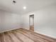 Room with hardwood flooring, white walls, and recessed lighting at 975 Memory Ln, Lawrenceville, GA 30044