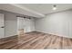 Spacious room with new hardwood flooring and a sliding barn door at 975 Memory Ln, Lawrenceville, GA 30044