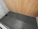Chic shower floor with eye-catching black and white hexagon tiling at 975 Memory Ln, Lawrenceville, GA 30044