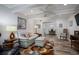 Inviting living room featuring wood-look floors, stylish furnishings, and an open layout at 138 Elysian Nw Way, Atlanta, GA 30327