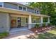 Close up of the home's front porch and landscaping details at 174 Rivertown Rd, Fairburn, GA 30213